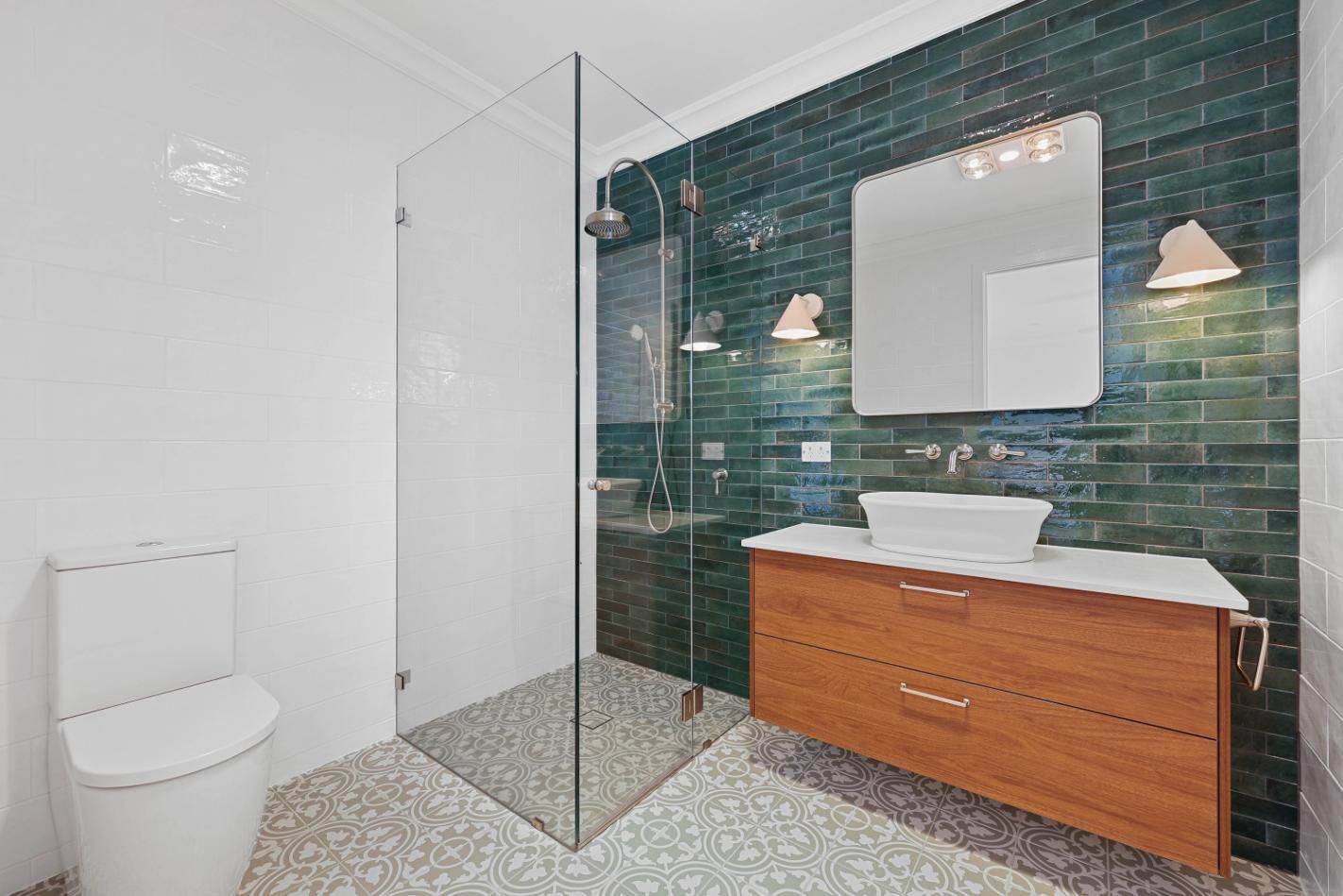 Modern Bathroom With Glass Shower, White Toilet — Above & Beyond Interiors in Smeaton Grange, NSW