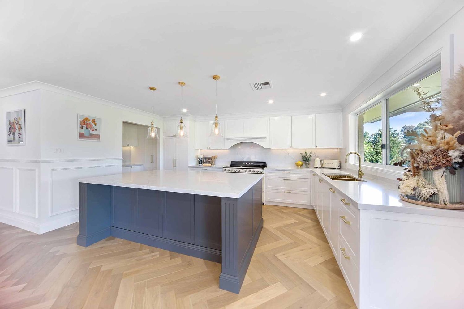 Bright Modern Kitchen With White Cabinetry — Above & Beyond Interiors in Smeaton Grange, NSW