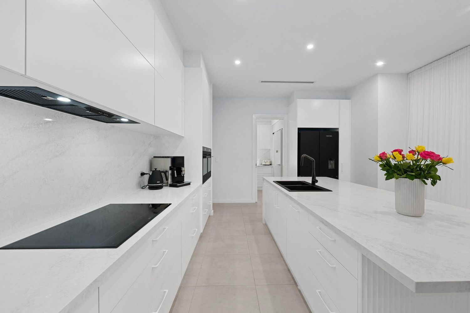 Bright White Modern Kitchen With Island, Built-in Appliances — Above & Beyond Interiors in Smeaton Grange, NSW