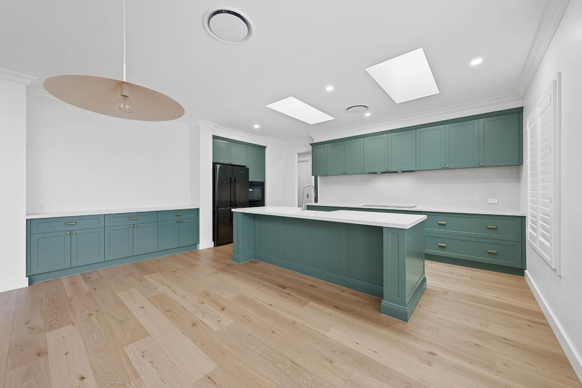 Modern Kitchen With Teal Cabinets, White Countertops — Above & Beyond Interiors in Smeaton Grange, NSW