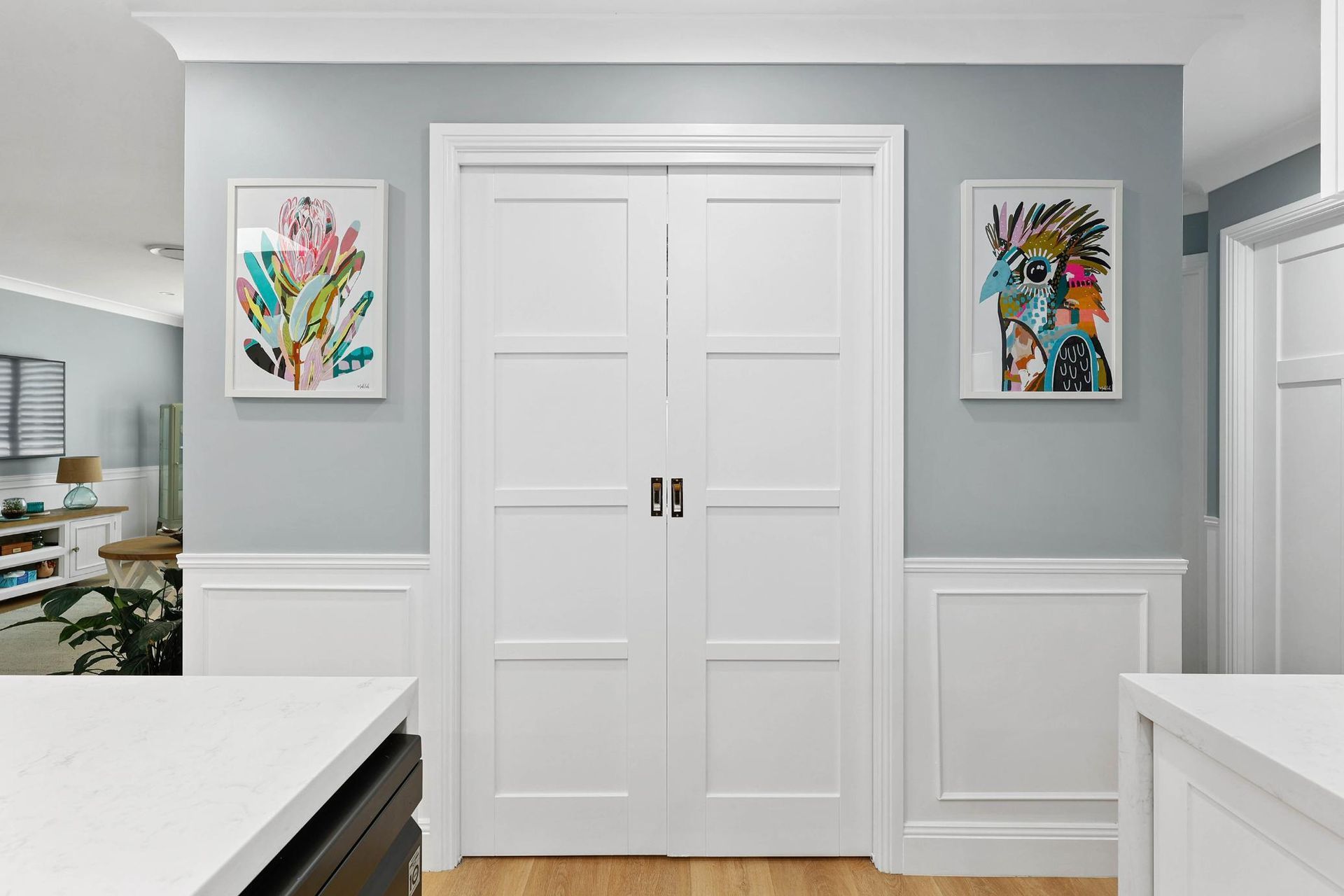 Bright Hallway With White Double Doors — Above & Beyond Interiors in Smeaton Grange, NSW