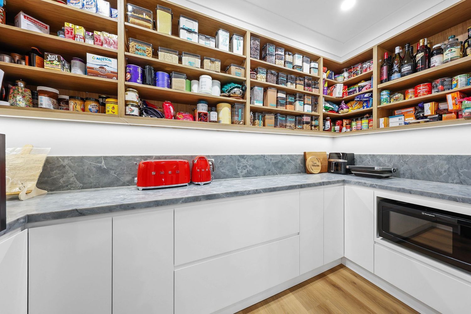 Modern Kitchen With White Cabinets, Wood Shelves — Above & Beyond Interiors in Smeaton Grange, NSW