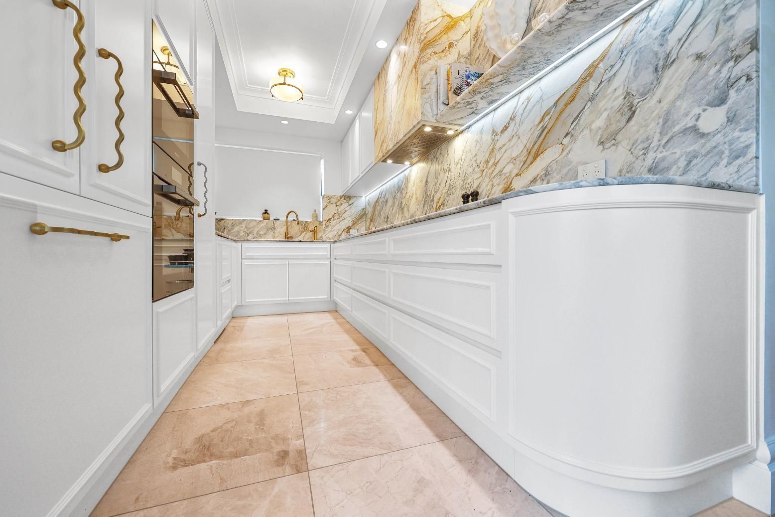 Bright Narrow Hallway With White Wainscoting — Above & Beyond Interiors in Smeaton Grange, NSW