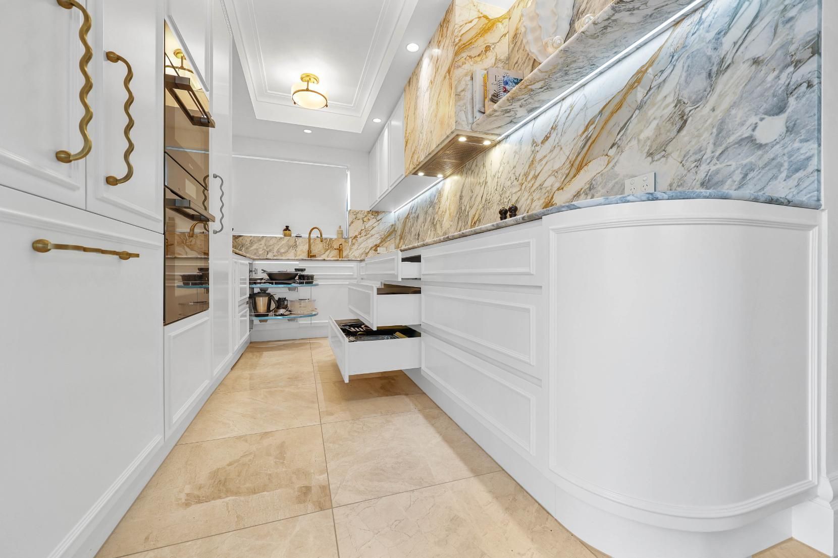 Elegant White Hallway With Marble-look Walls — Above & Beyond Interiors in Smeaton Grange, NSW