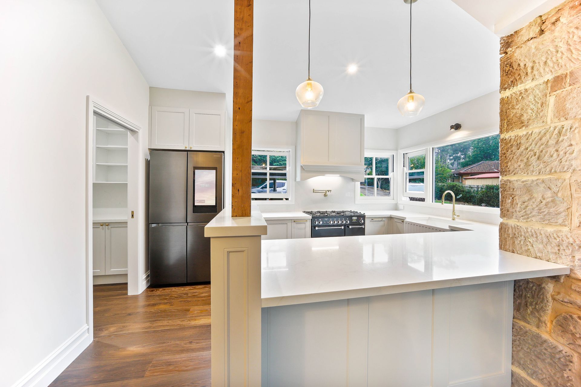 Bright Modern Kitchen With White Island — Above & Beyond Interiors in Smeaton Grange, NSW
