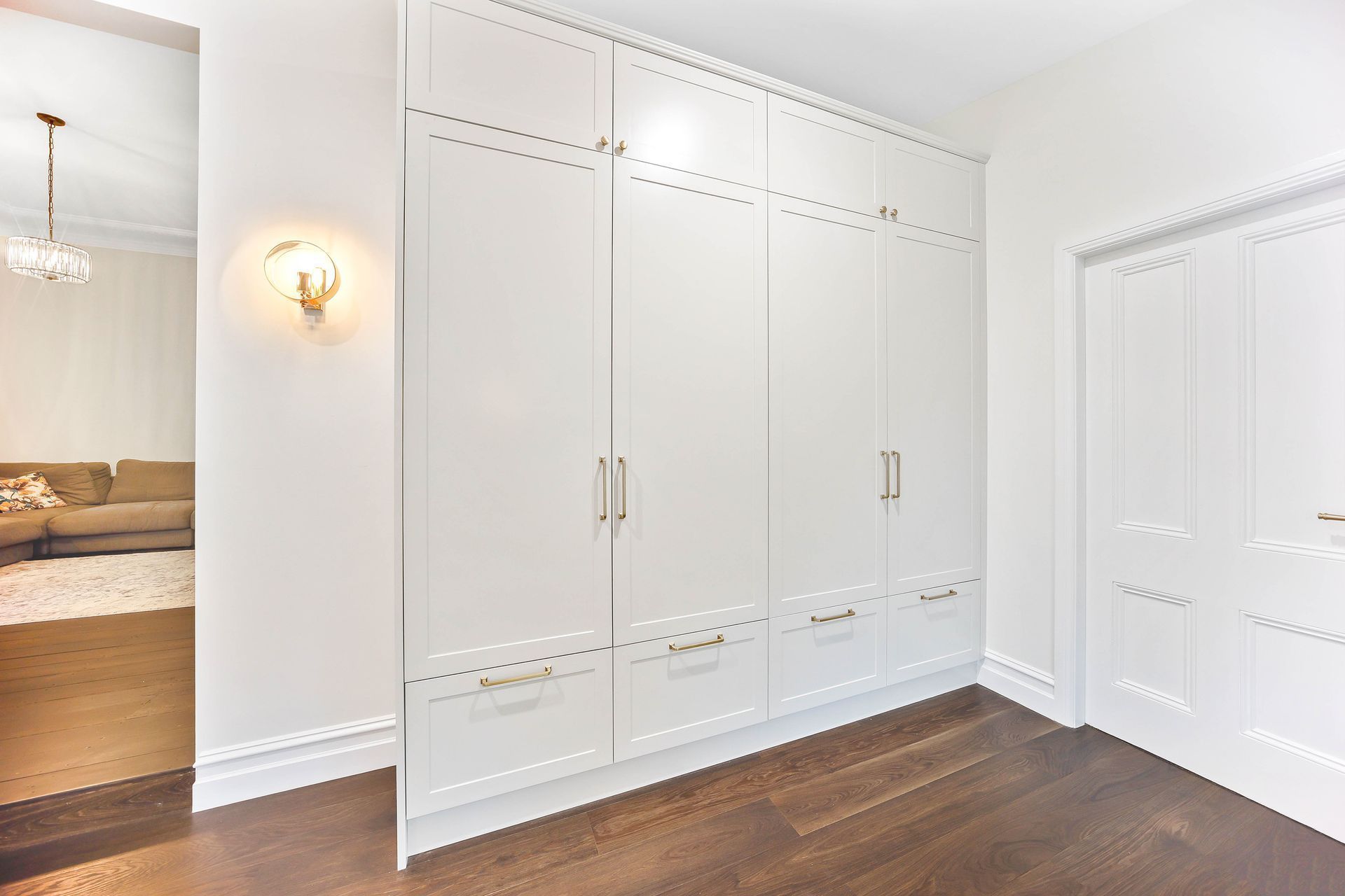 Bright White Built-in Wardrobes With Gold Handles — Above & Beyond Interiors in Smeaton Grange, NSW