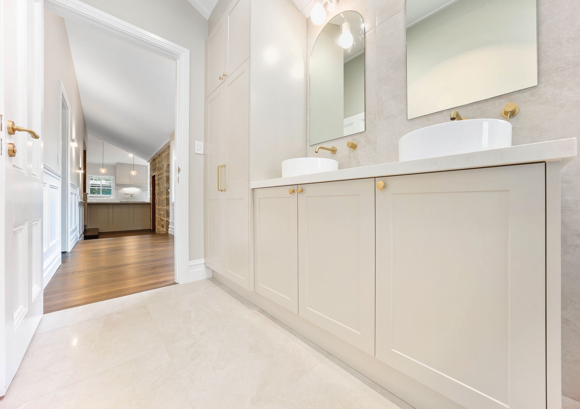Bright Hallway With Built-in Vanity, White Cabinets — Above & Beyond Interiors in Smeaton Grange, NSW