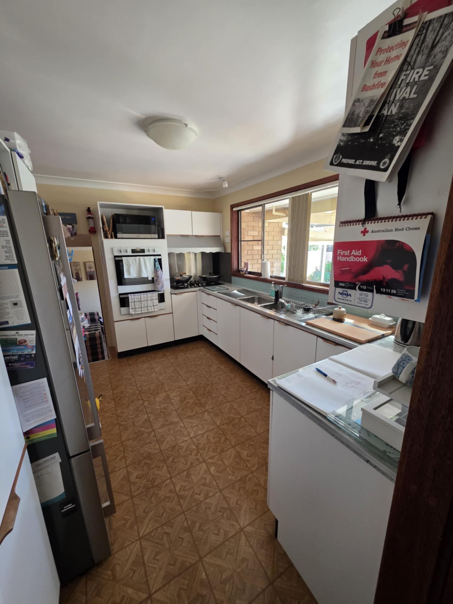 Bright Kitchen with White Cabinets — Above & Beyond Interiors in Smeaton Grange, NSW