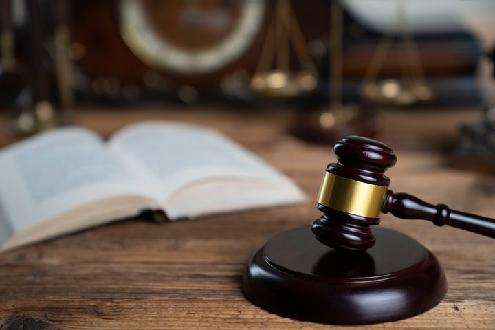 Gavel and hammer on wooden table — Billings, MT — Finn Law PLLC