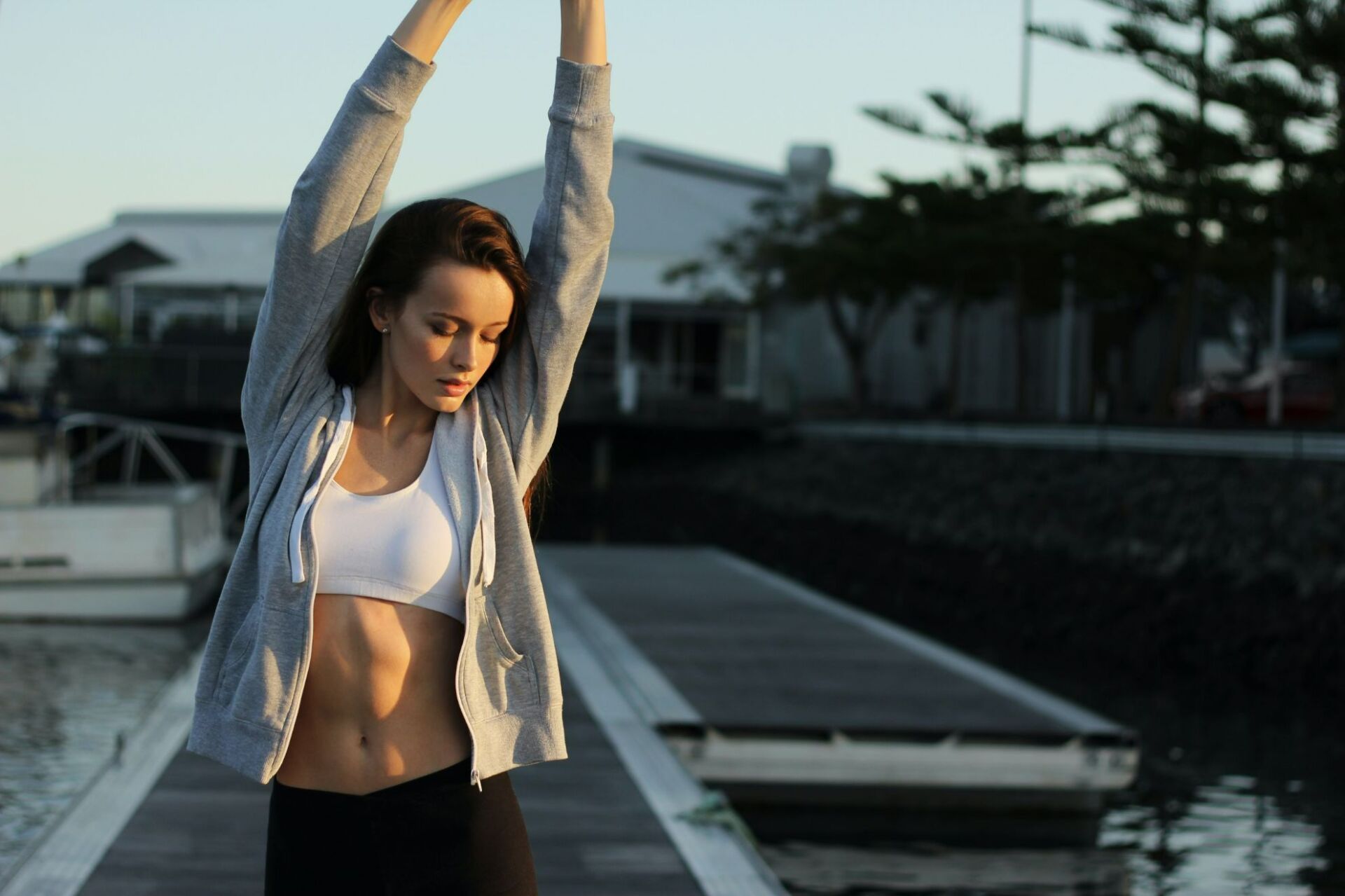 Woman Doing Her Stretching — Colonic Healthcare in Rosslea, QLD