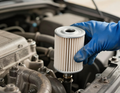 New oil filter being installed