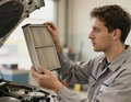 Air filter held up to light