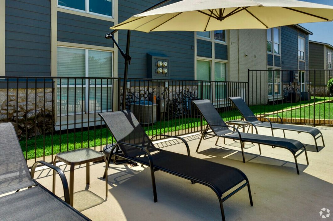 Interior photo of a seating area overlooking the city