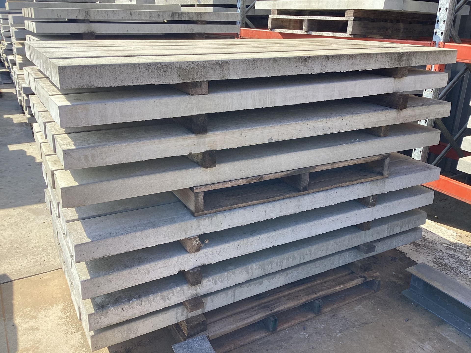 Stack of Rectangular Concrete Slabs on Wooden Pallets — NQ Prefab Concrete Products Pty Ltd in Coconuts, QLD