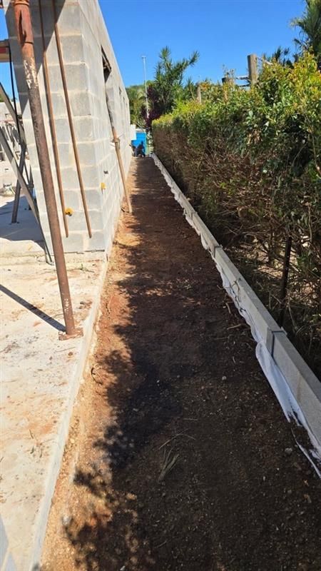 Raised Garden Bed With Red and White Flowers — NQ Prefab Concrete Products Pty Ltd in Coconuts, QLD