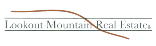 A logo for lookout mountain real estate with a red line through it.