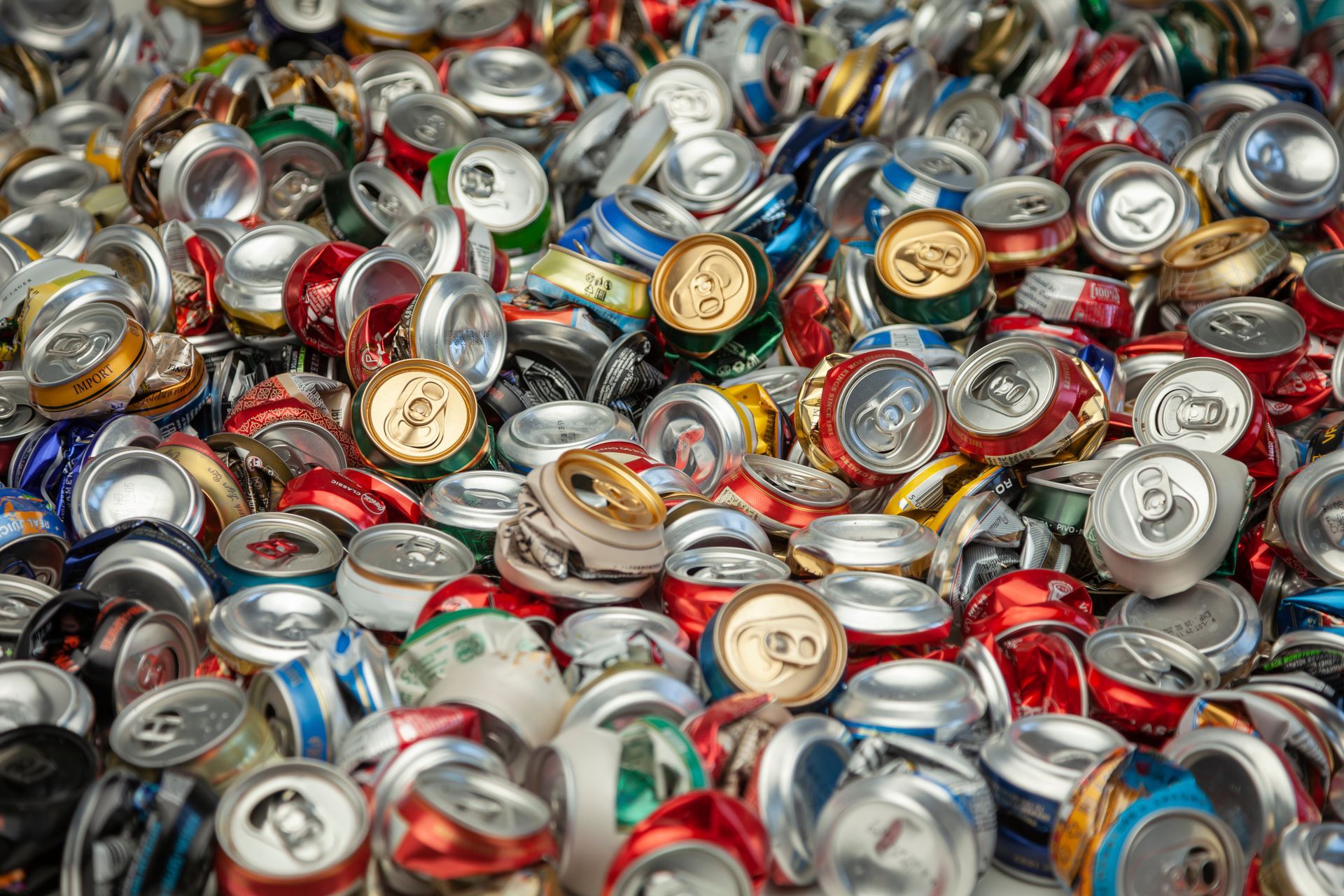 A close-up of a pile of crushed aluminium metal cans.