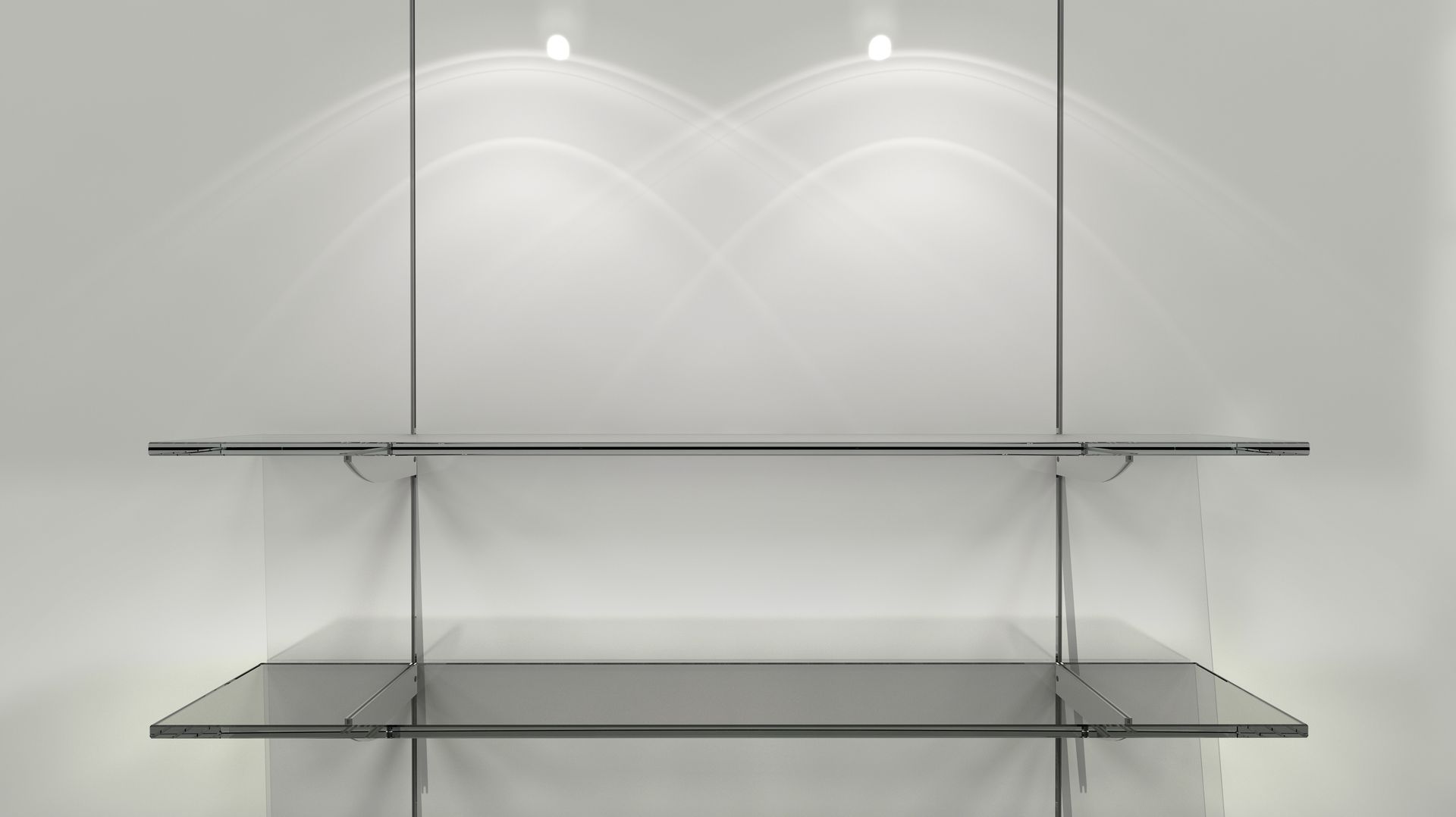 Empty glass shelves against a white wall with three spotlights above