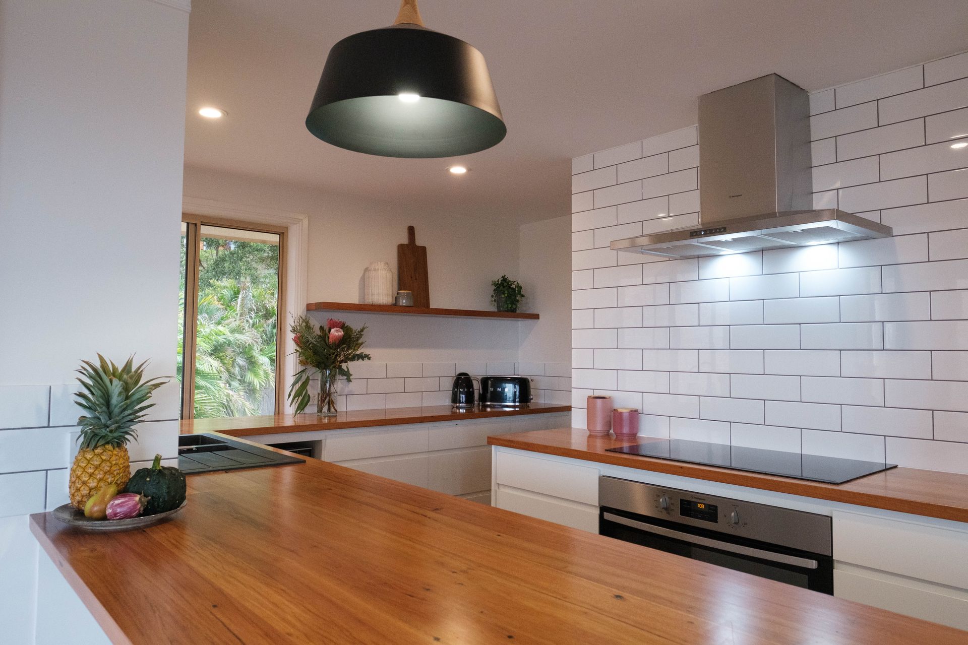 A Kitchen With White Cabinets and a Mixer on the Counter — Flow Kitchens in Taree South, NSW