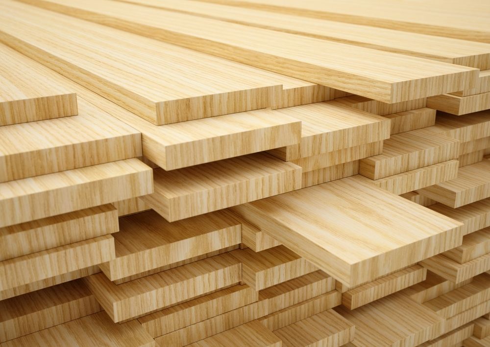 A Pile of Wooden Boards Stacked on Top of Each Other — Flow Kitchens in Old Bar, NSW