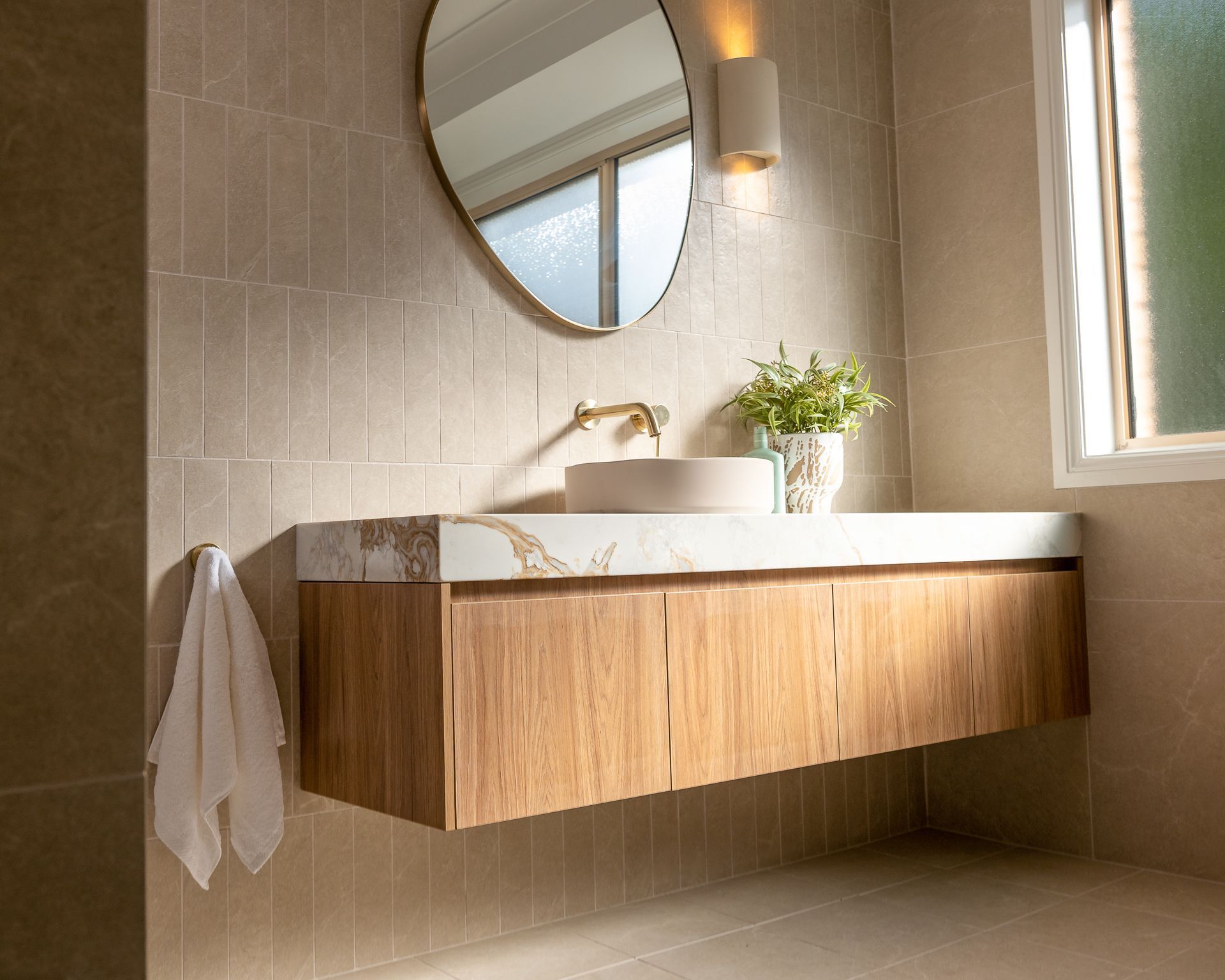 A Bathroom With a Wooden Vanity and a Sink — Flow Kitchens in Taree South, NSW