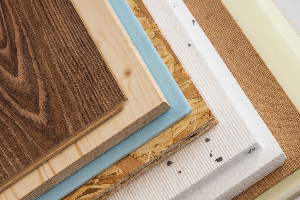 A Stack of Different Types of Wood and Foam — Flow Kitchens in Taree South, NSW