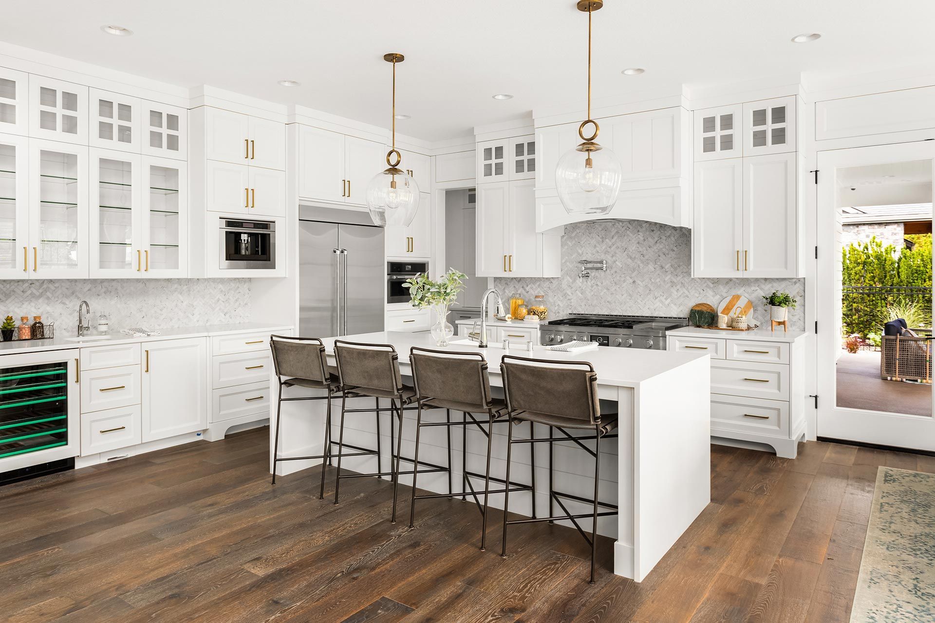 Beautiful white kitchen in new luxury home. Beautiful white kitchen in new luxury home.