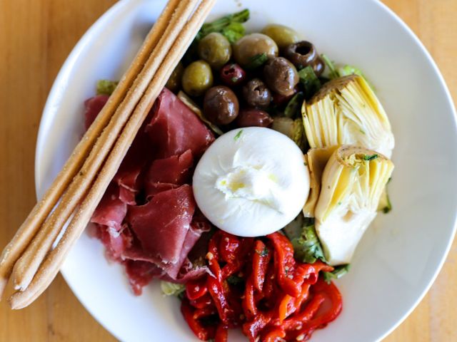Antipasti spread with burrata, prosciutto and olives