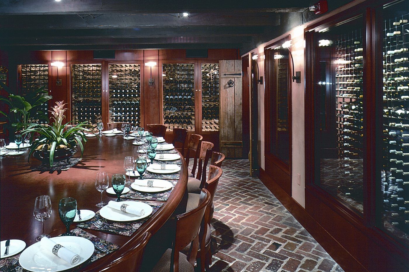 Wine Cellar private dining room walled in bottles
