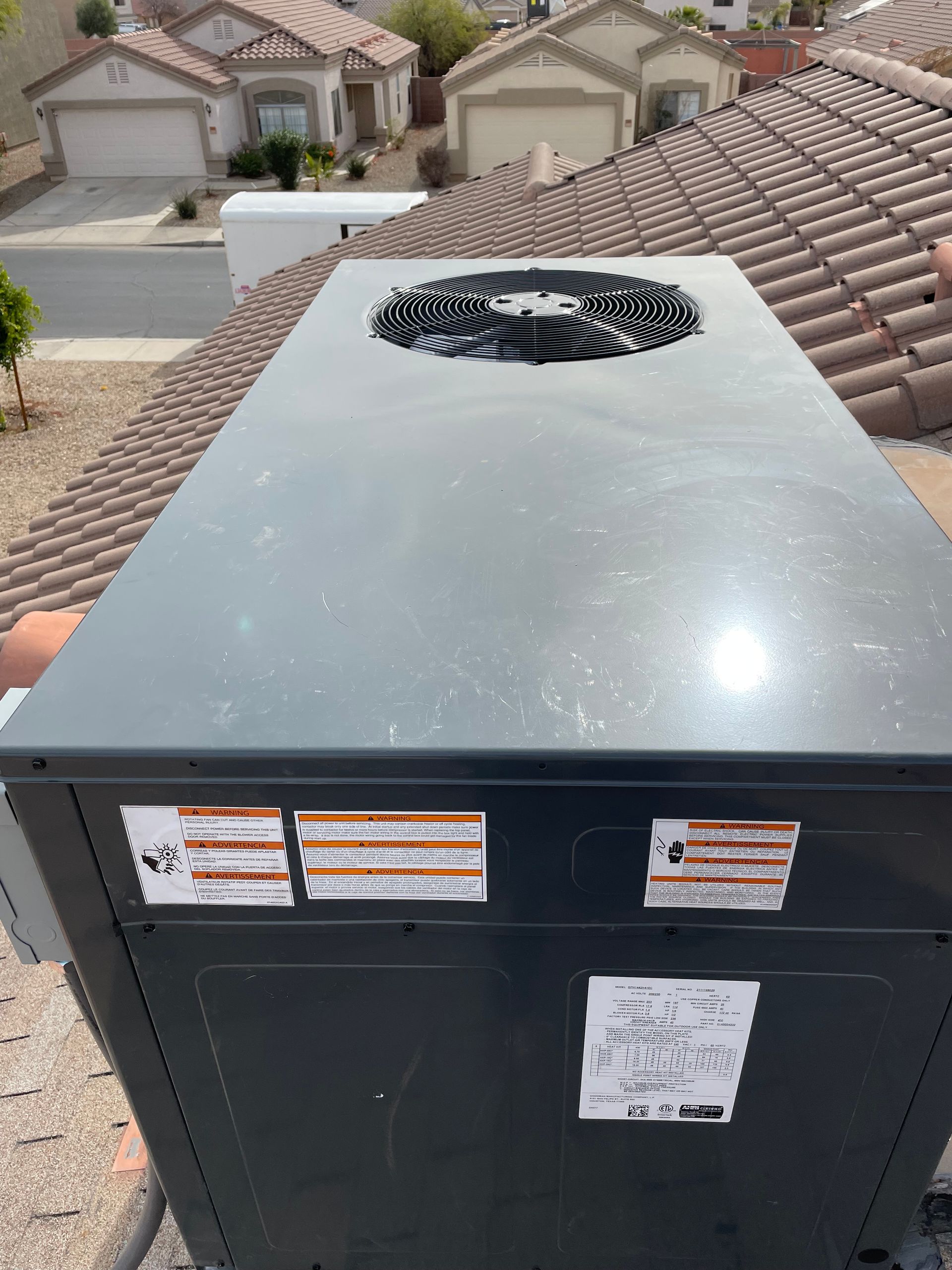 HVAC Unit Beside The Roof — Buckeye, AZ — HOMEFRONT AIR CONDITIONING LLC