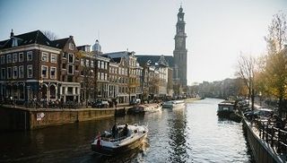 Western church ans canalhouses along the prince's canal in the Jordaan district of Amsterdam
