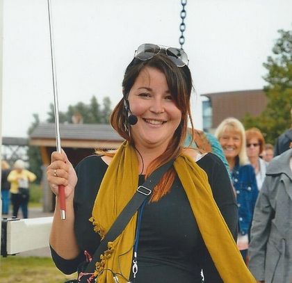 Local Guide Mariska a picture of Local Guide Mariska wearing a headset