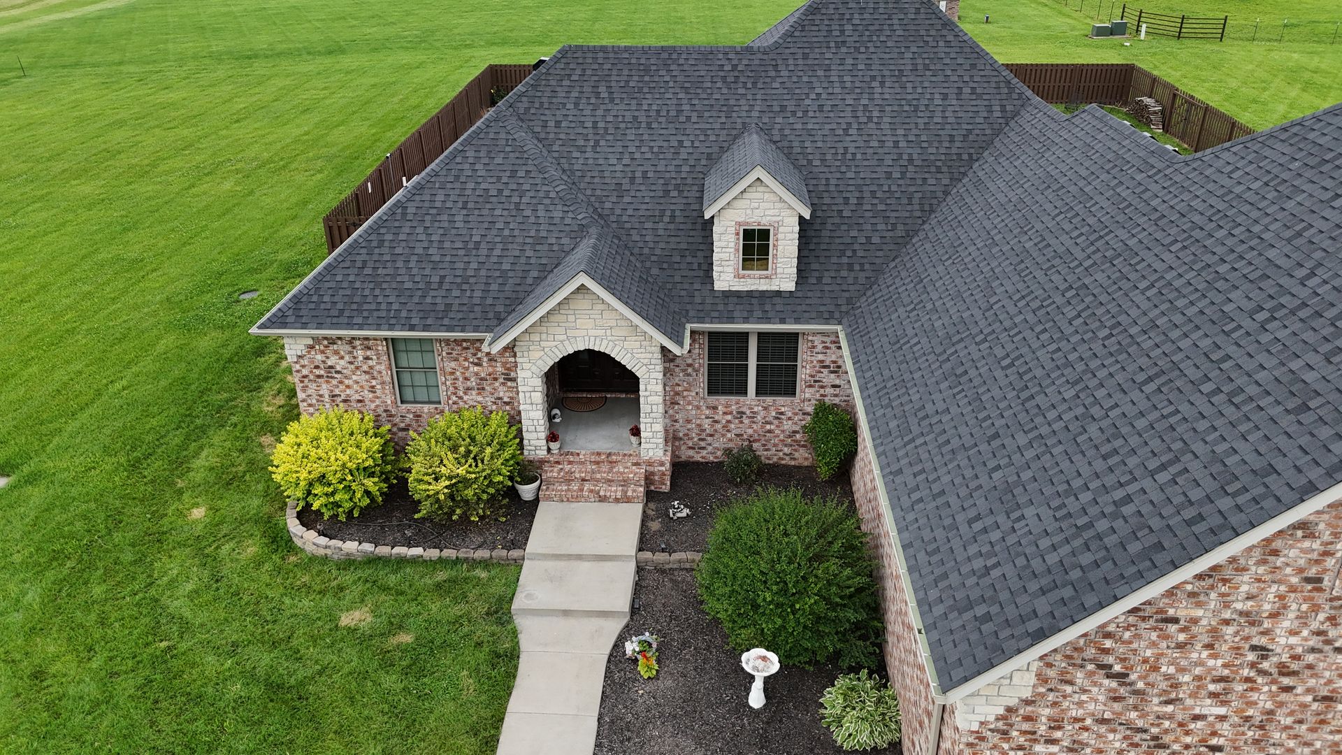Home with new roof and siding by top exterior home contractor in Springfield, MO