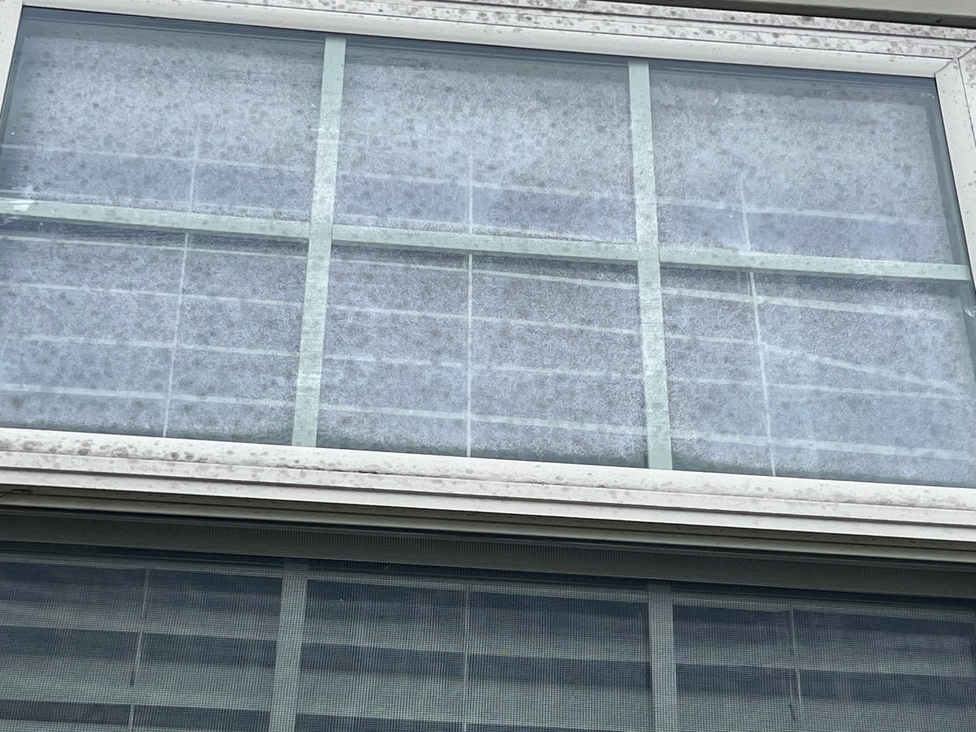 A close up of a window with a filter on it.
