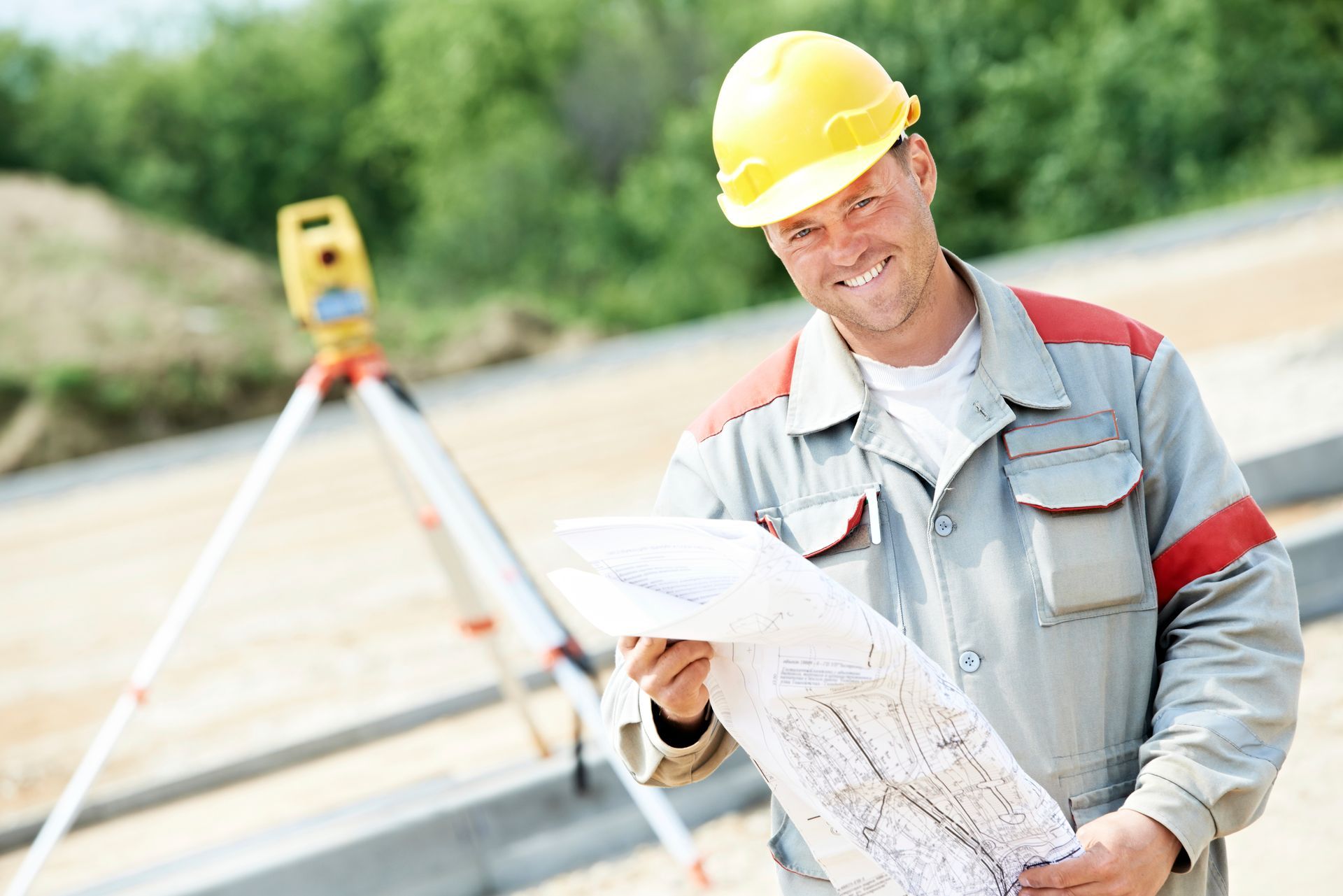 Surveyor works with theodolite