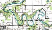 Topographical map section: Portland State Game Area, green river winds through landscape.