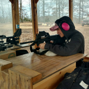 girl shooting gun