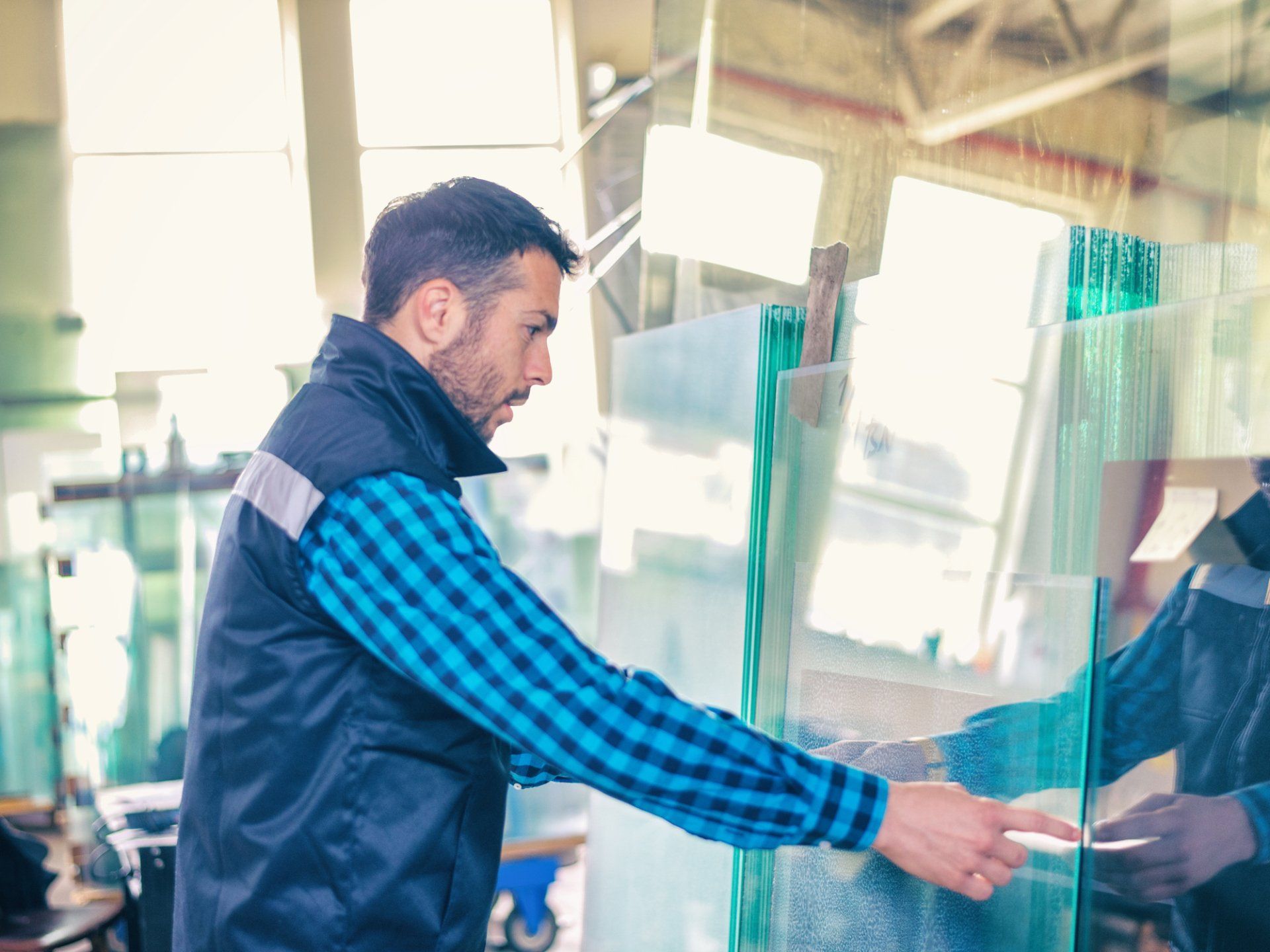 man installing glass