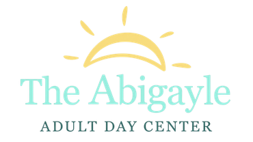 Logo for The Abigayle Adult Day Center, with a yellow sun and teal text on a white background