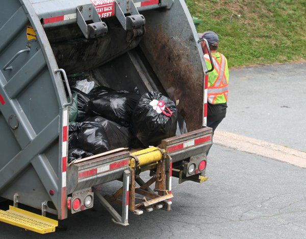 Garbage Truck Full of Garbage — Lock Haven, PA — Love Disposal, Inc. Garbage Truck Full of Garbage — Lock Haven, PA — Love Disposal, Inc.