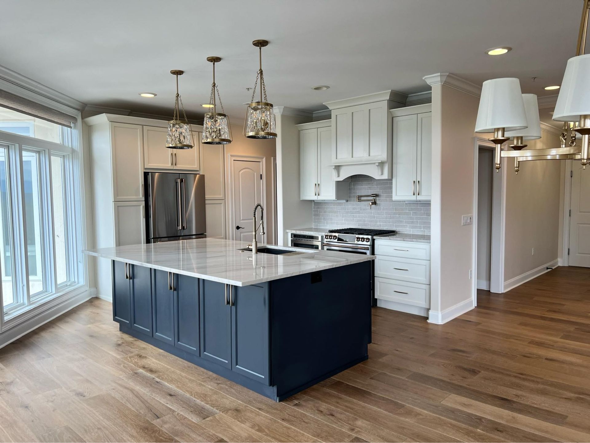 There is a large island in the middle of the kitchen