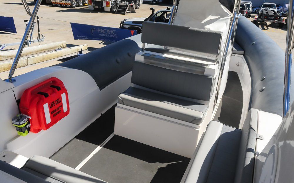 A boat with a red bag on the back of it LIFECELL products
