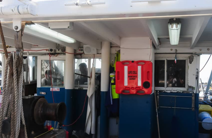 A boat with a red sign that says ii on it LIFECELL products