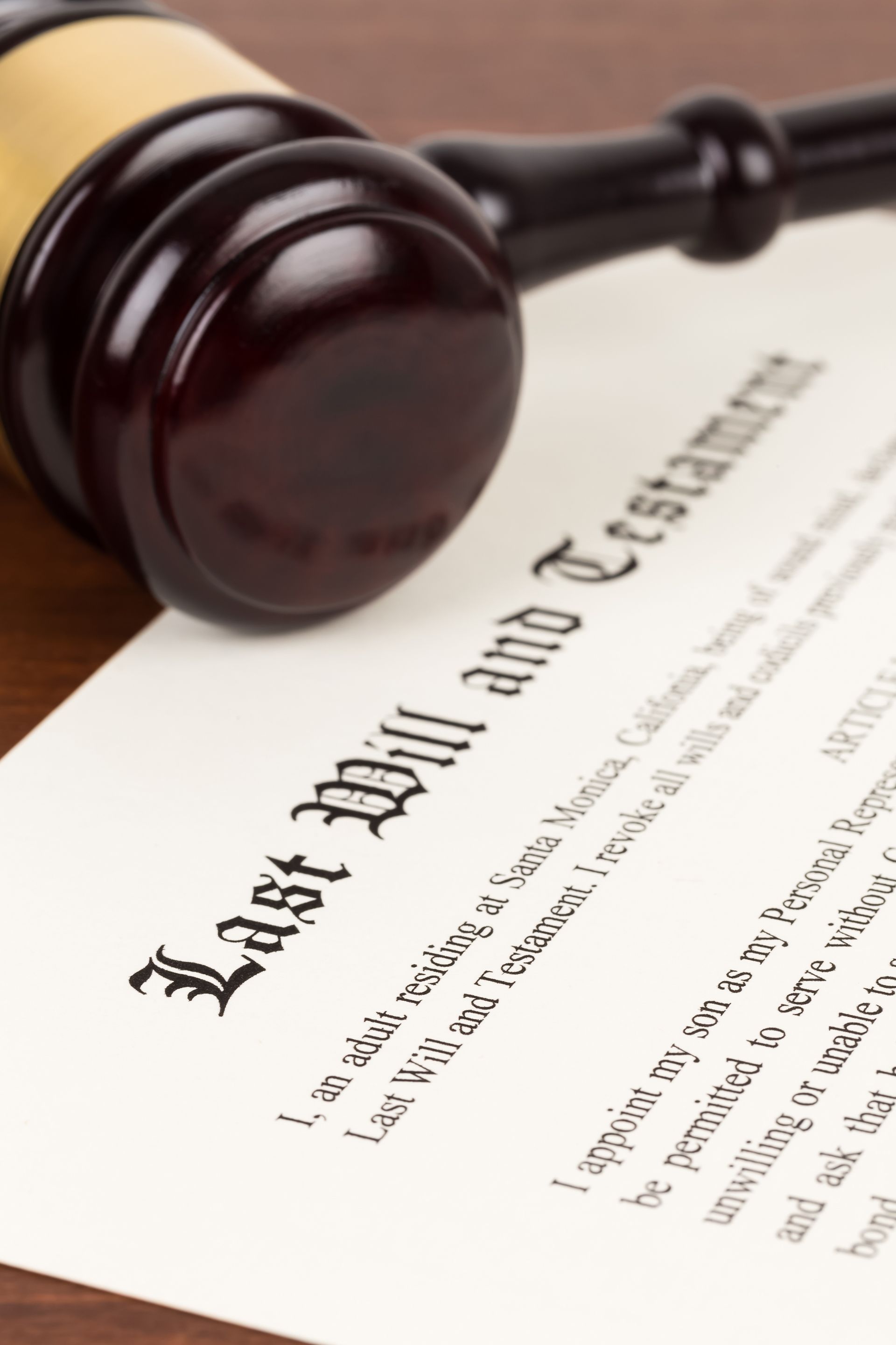 A Gavel is Sitting on Top of a Last Will and Testament