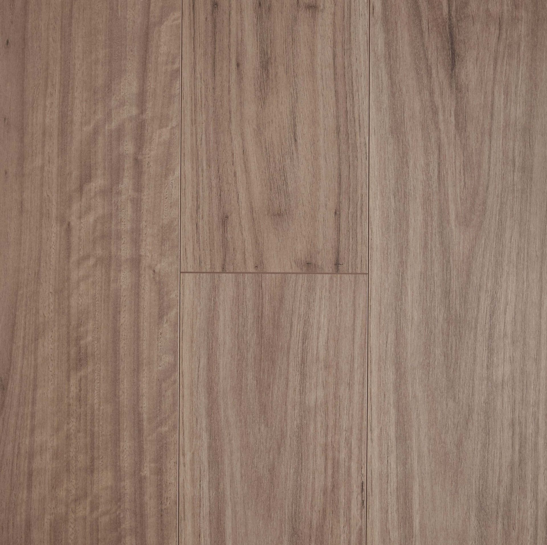 Close-up of hardwood flooring; light brown tones, vertical wood grain.