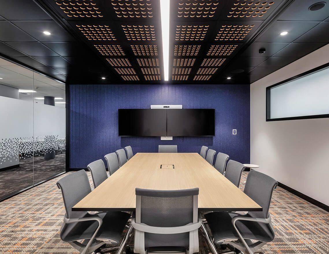 A Conference Room with A Long Table and Chairs — Tony Di Milia Flooring in Unanderra, NSW