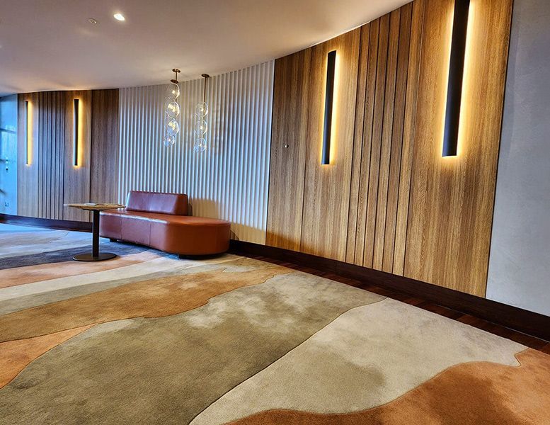 There Is a Couch and A Table in The Hallway — Tony Di Milia Flooring in Unanderra, NSW