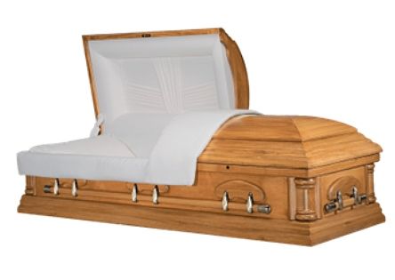 Open coffin made of light wood with a white satin interior