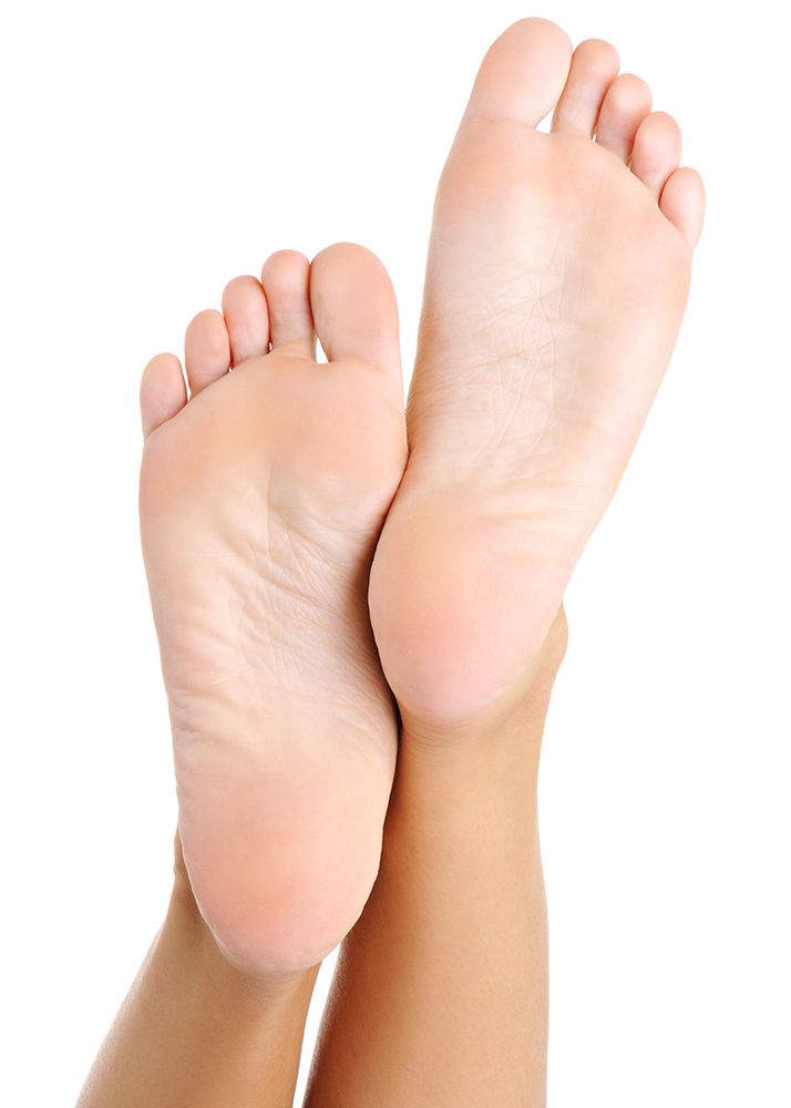 Two bare feet, soles facing up.