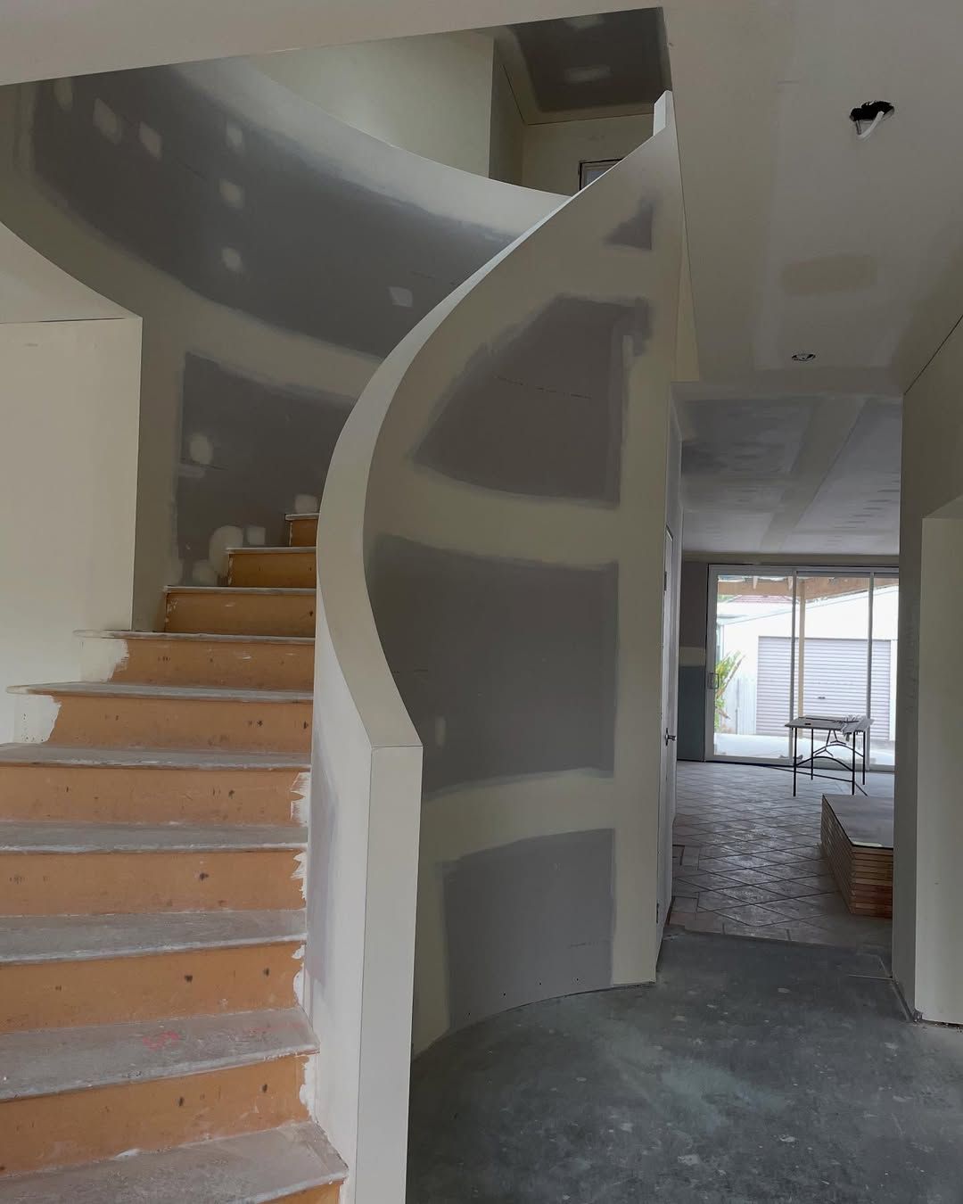 Curve staircase with gyprock setting finish. Sheeted high end finish Booker Bay NSW